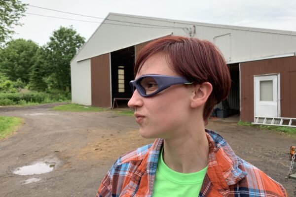 A picture of a woman wearing safety glasses